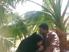 An Iraqi girl sucks her lover 's penis in a public place